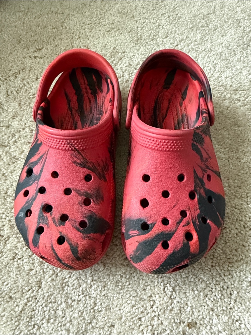CROCS Kids Red and Black Marbled Clogs. Size 2